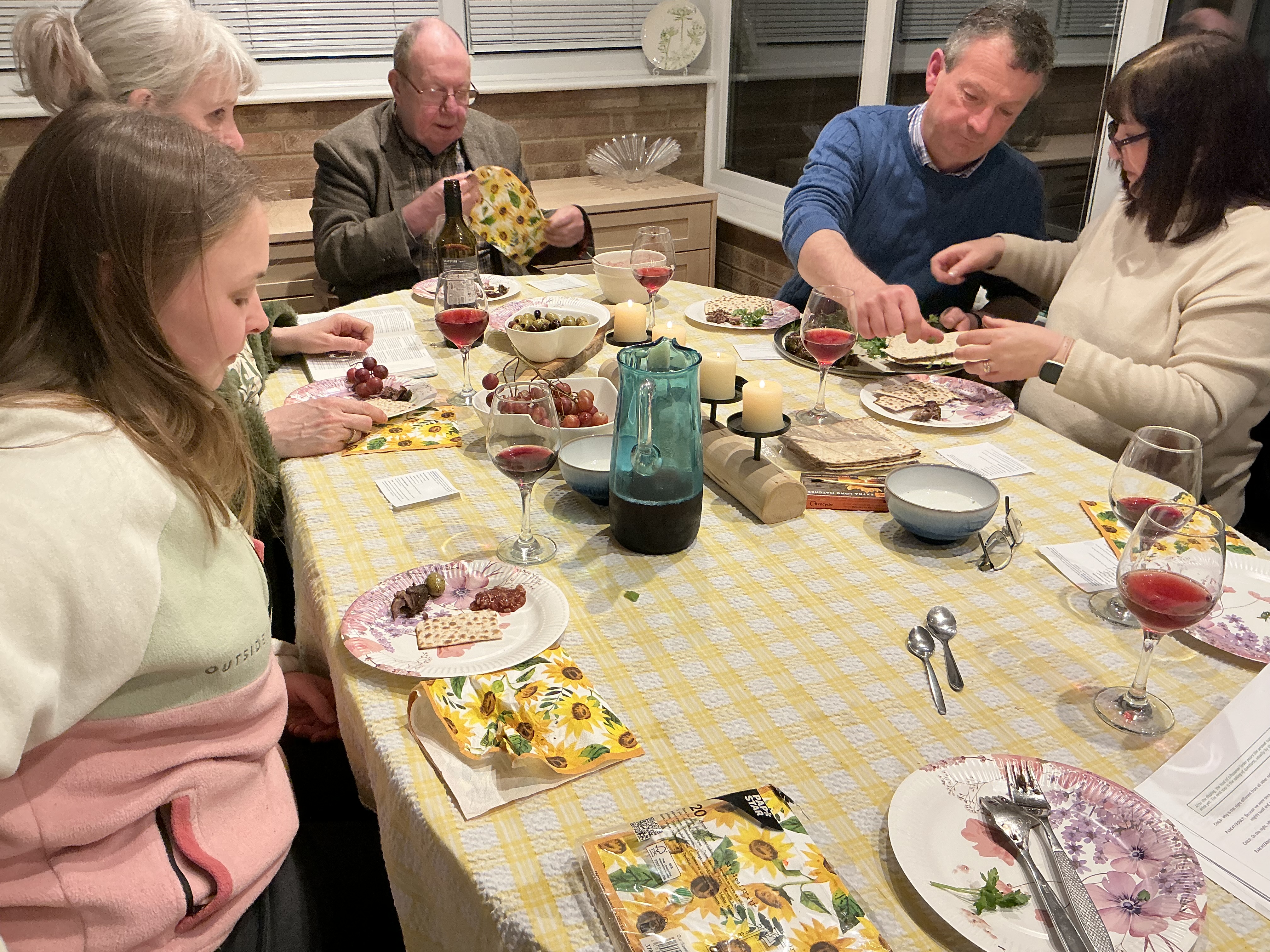 Small group sharing a Passover Meal